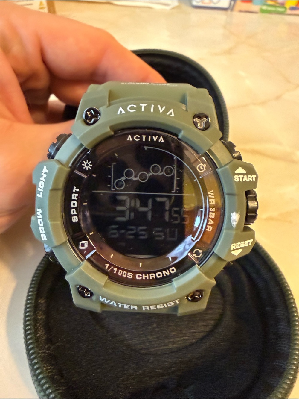 Activa Olive Green Digital Sport Watch with case and free charm.
